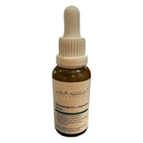 Bottle of Skin Nutrition Botanicals Niacinamide 5% + Squalane Serum on a white background