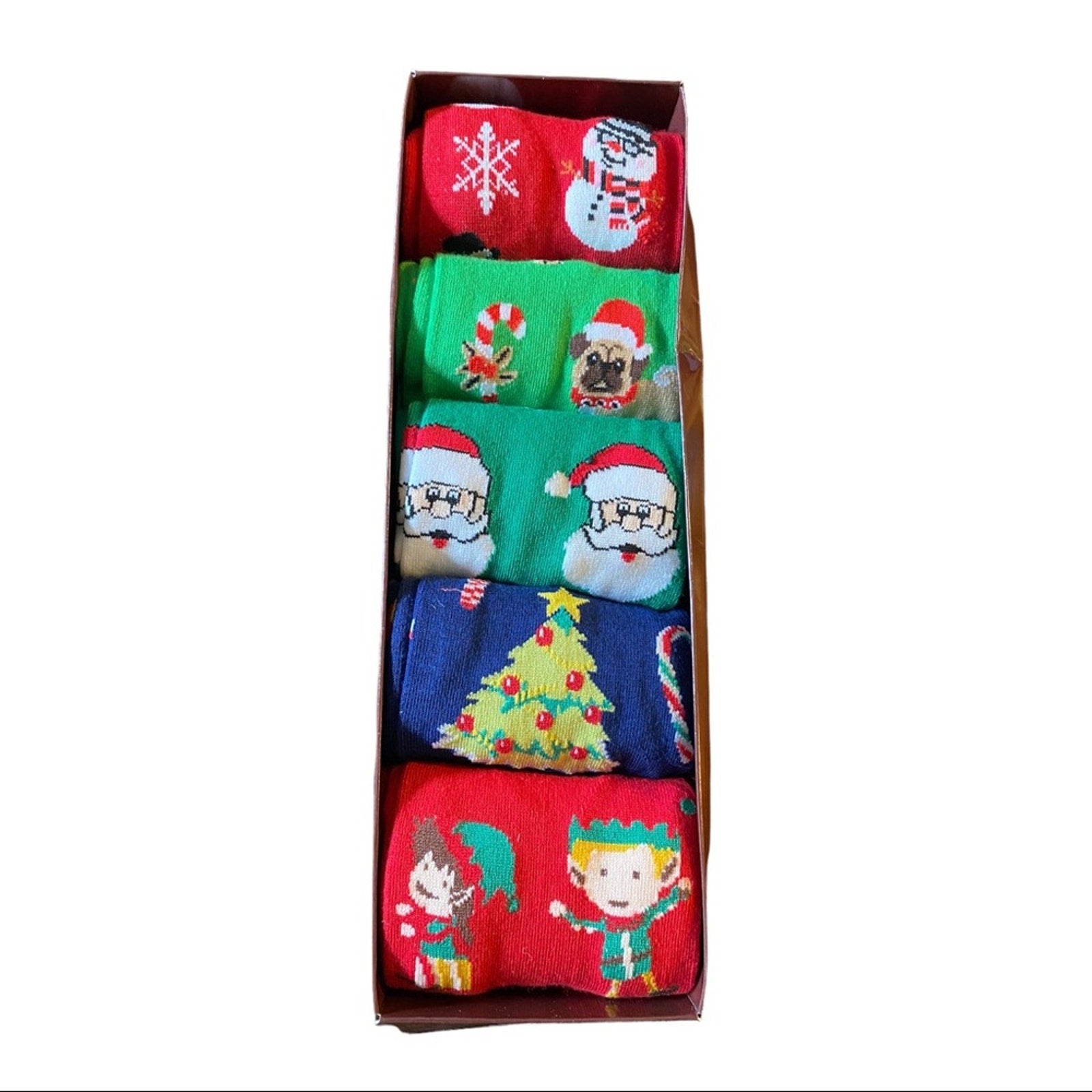 Box of Christmas-themed socks with various designs including Santa Claus, a pug, and an elf.