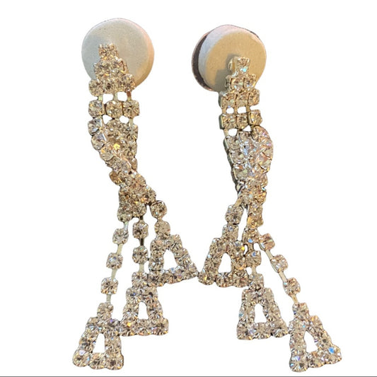 Elegant earrings with rhinestone embellishments on a white background