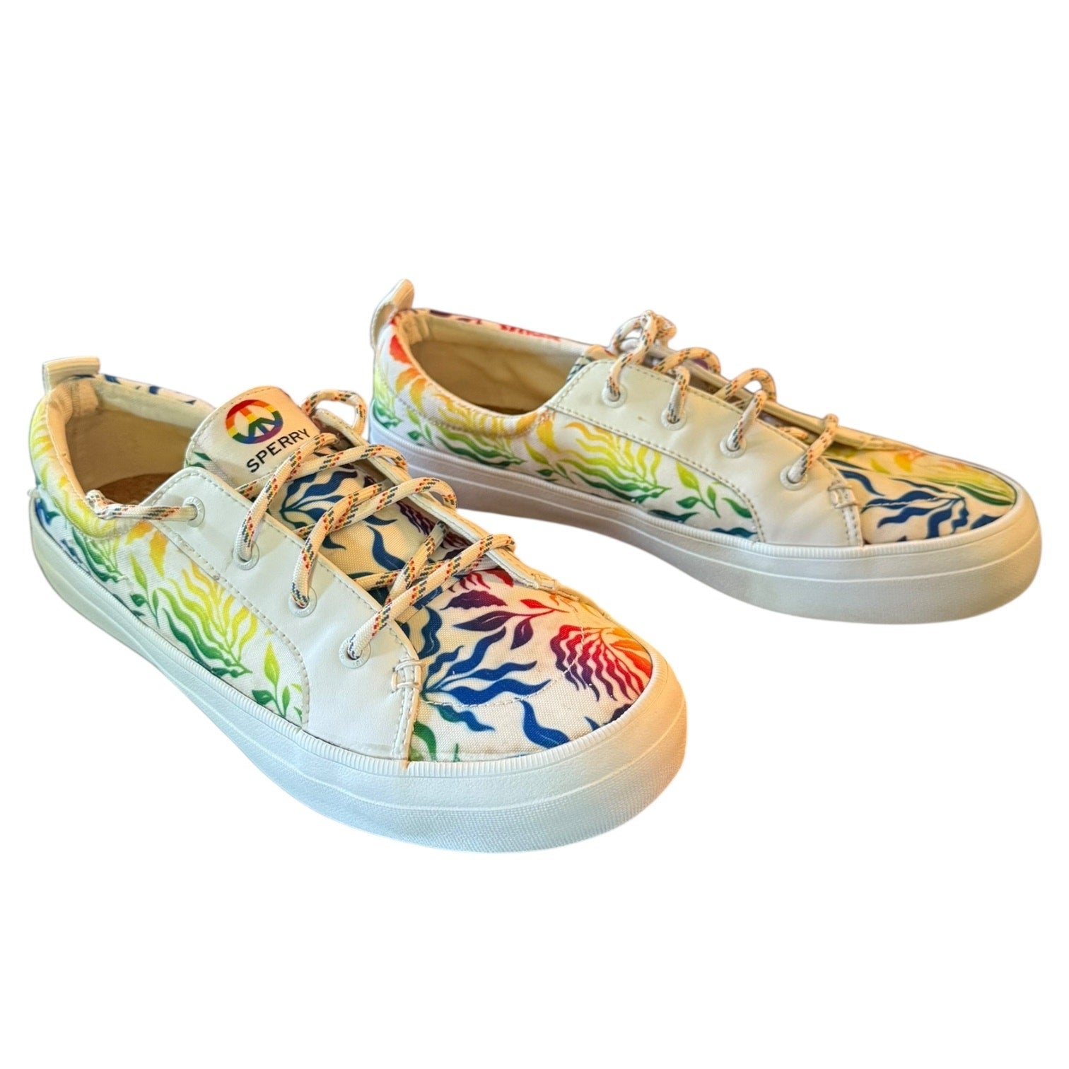 Colorful sneakers with floral patterns on a white background
