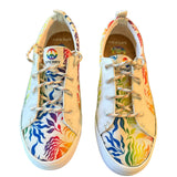 Front of Colorful sneakers with a rainbow pattern on a white background
