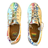 Top of Colorful sneakers with floral pattern and rainbow accents on a white background