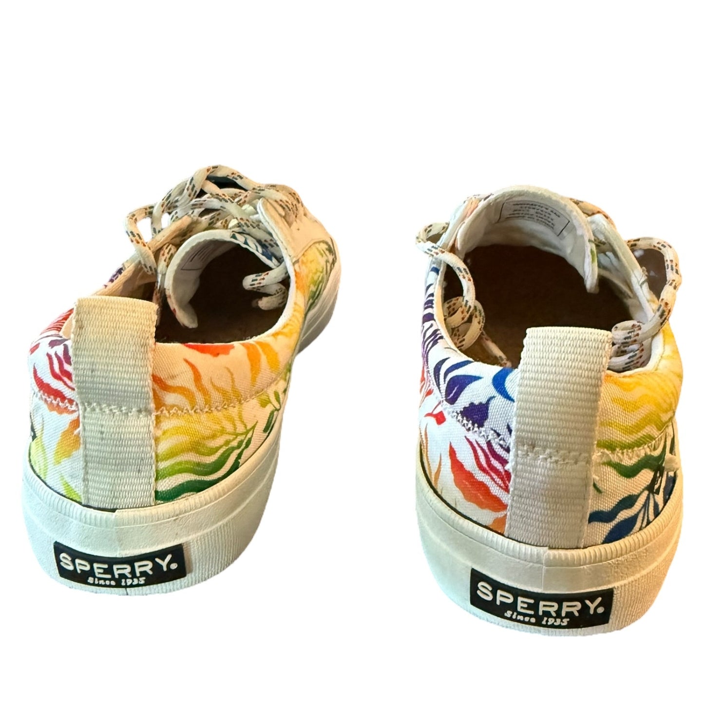 Back of Colorful Sperry sneakers with floral pattern on a white background