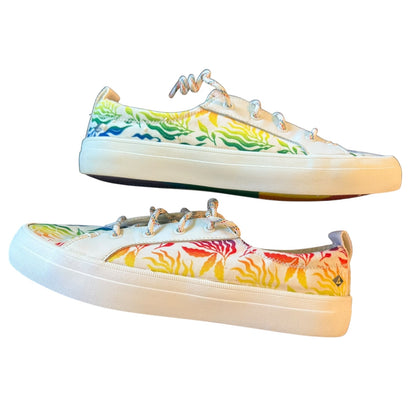 Side view of Colorful sneakers with a tie-dye pattern on a white background