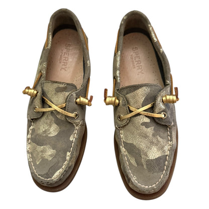 Front of Camouflage-patterned Sperry shoes with gold accents on a white background