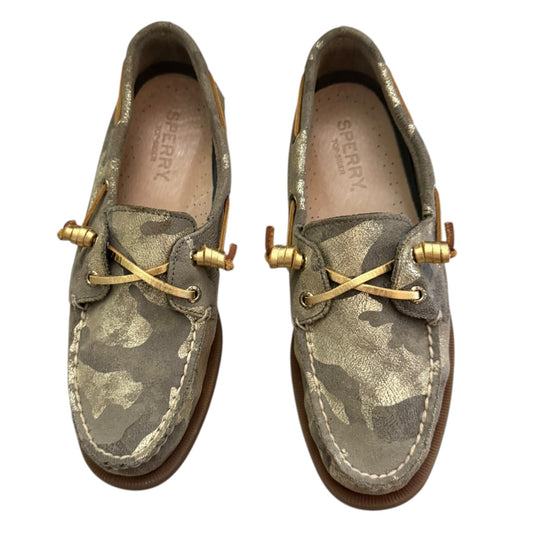 Front of Camouflage-patterned Sperry shoes with gold accents on a white background