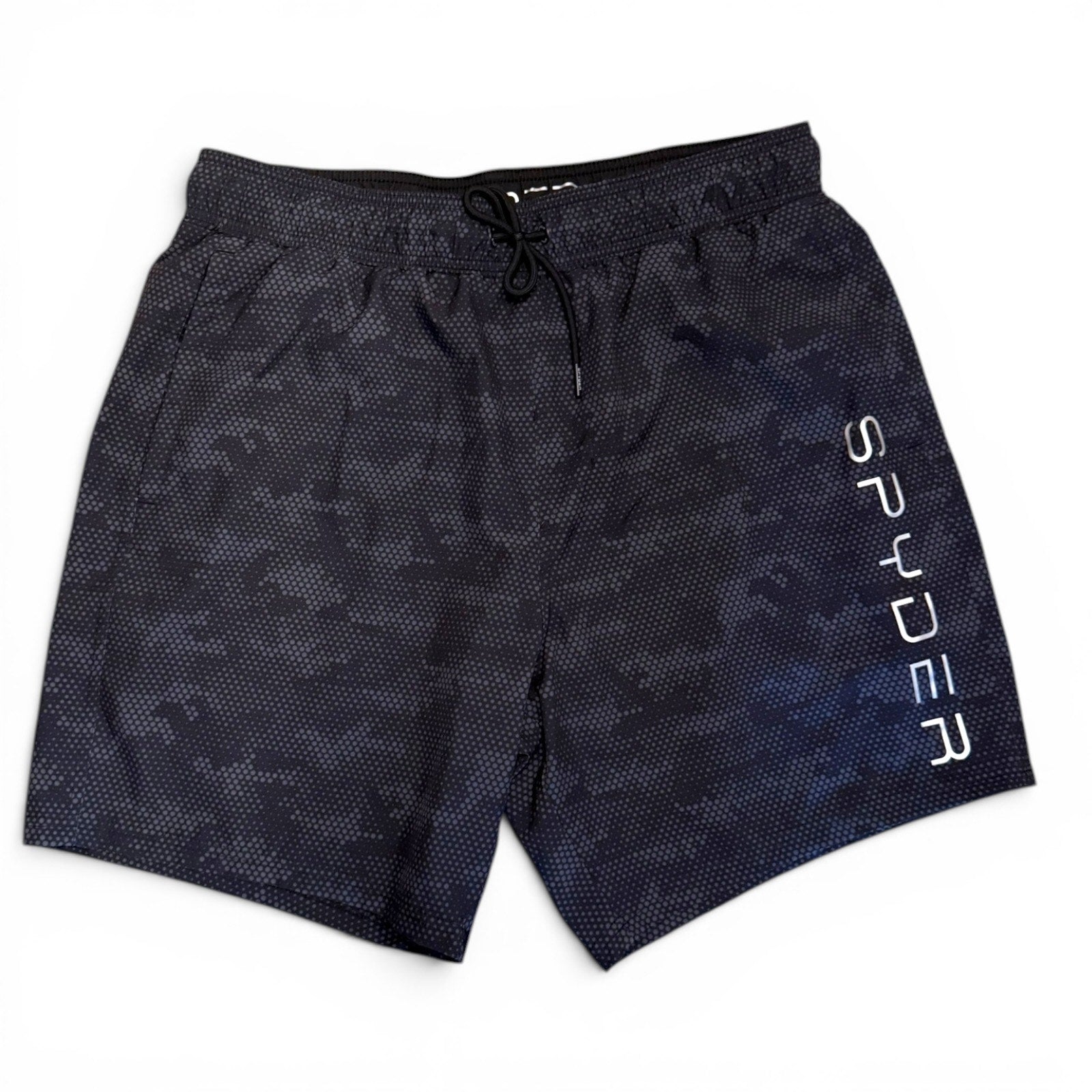 Front of Black patterned shorts with 'Spyder' branding on a white background