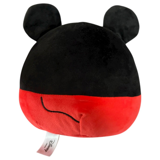 Back of Black and red plush toy with ears on a white background