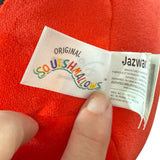Label on a red Squishmallows toy with 'Original Squishmallows' text.