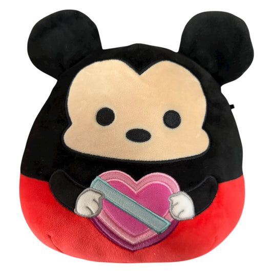 Plush toy with a heart design on a white background