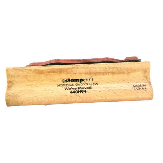 Wooden stamp side with red rubber pad and 'stampcraft' branding on a white background