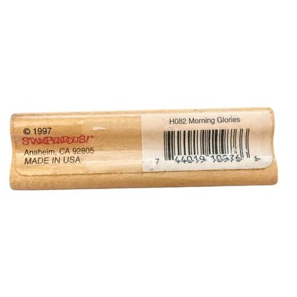 Wooden stamp block with a label on a white background