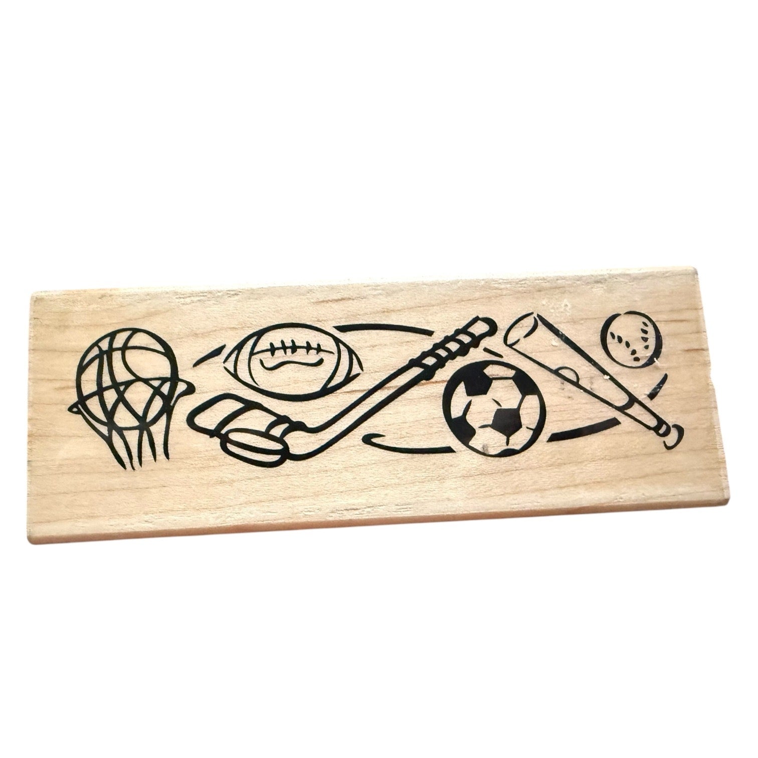 Wooden block with illustrations of sports equipment on a white background