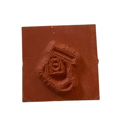 A rubber stamp of a stocking, shown against a plain white background.