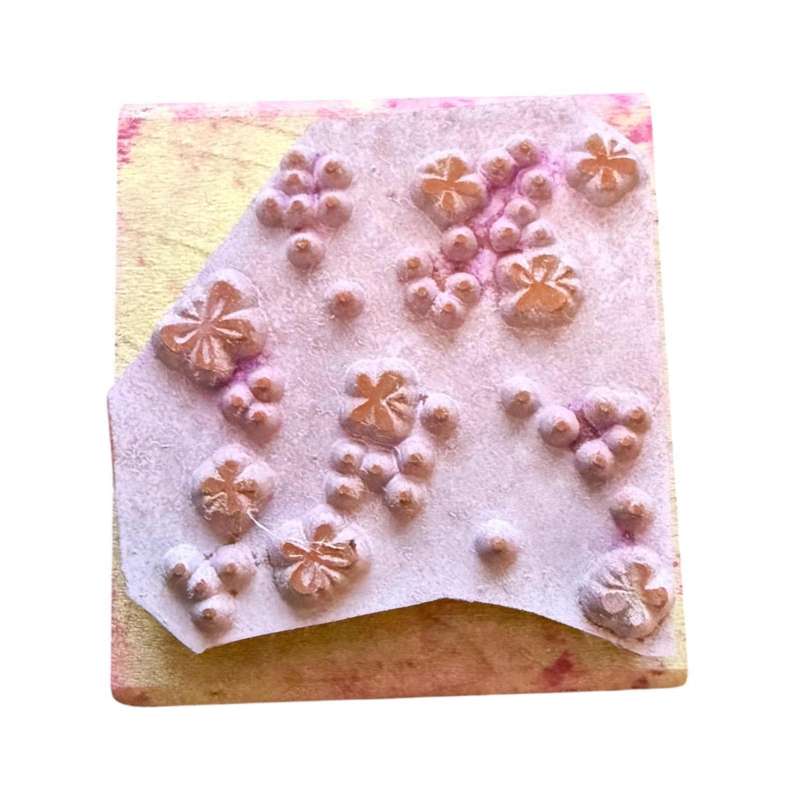 Rubber stamp with dots and butterflies on a white background