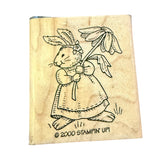 Wooden stamp with a rabbit in a dress holding an umbrella, featuring '2000 Stampin' Up!' branding.