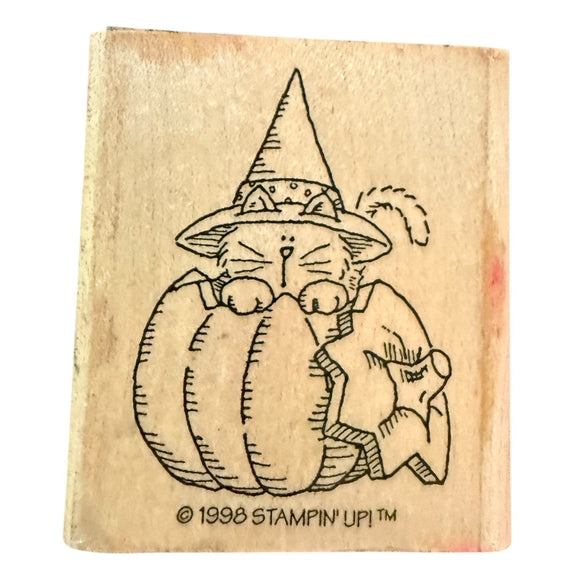 Rubber stamp with a cat in a witch hat and pumpkin design, featuring the Stampin' Up! logo.