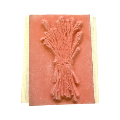Rubber stamp featuring wheat on a white background