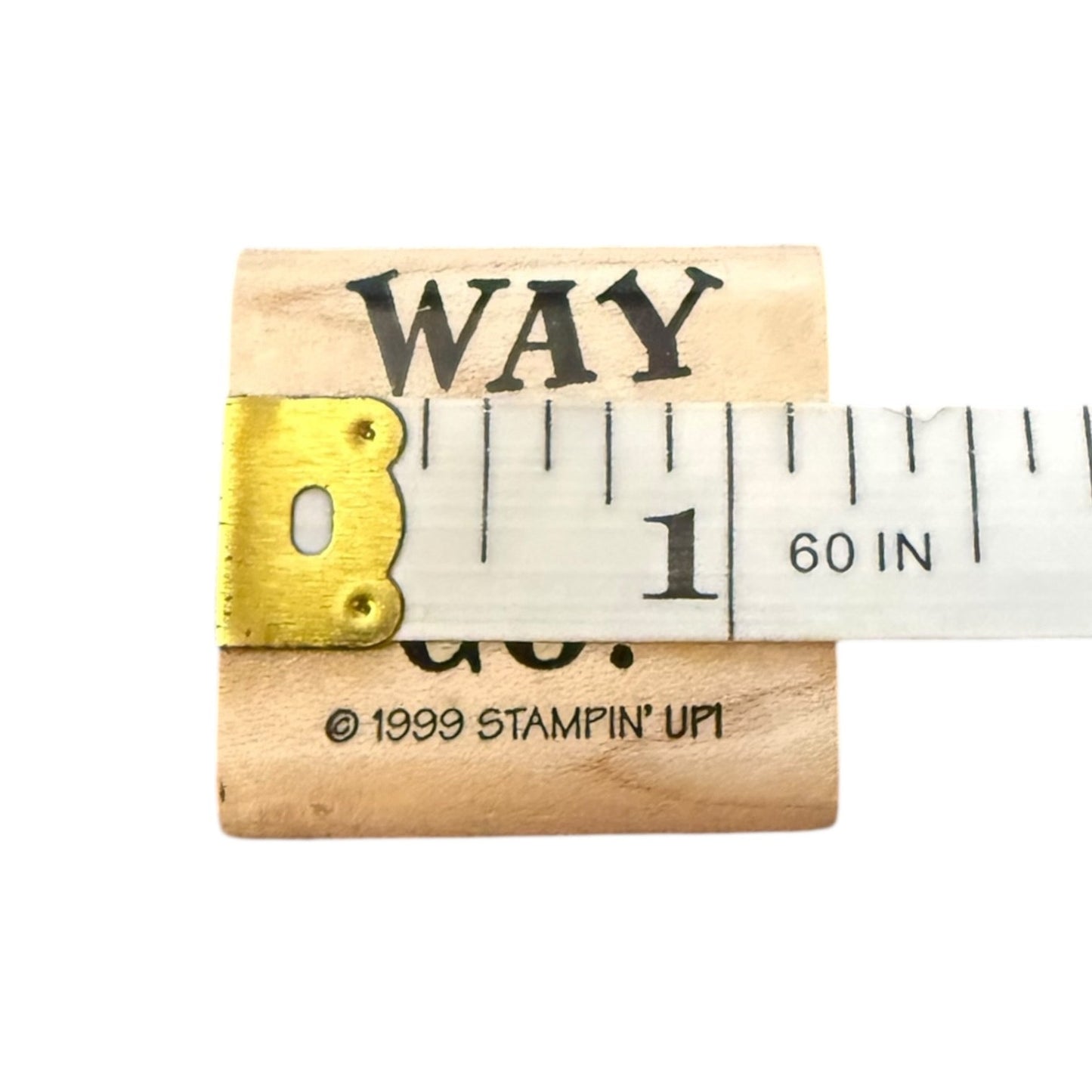 Wooden stamp with ruler featuring 'Stampin' Up!' branding.