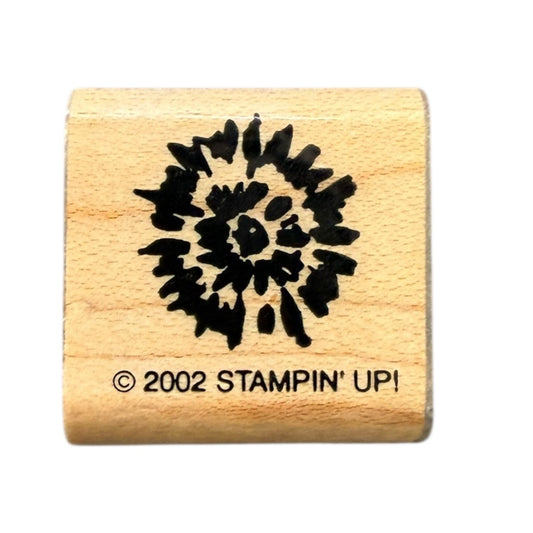 Wooden stamp with black floral design and '2002 Stampin' Up!' text on a white background