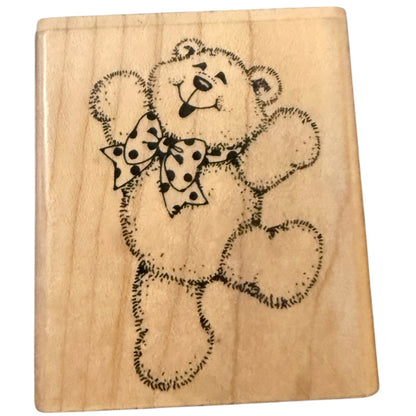 A square wood stamp featuring a black  teddy bear design with a polka-dot bow, shown on a plain white background.