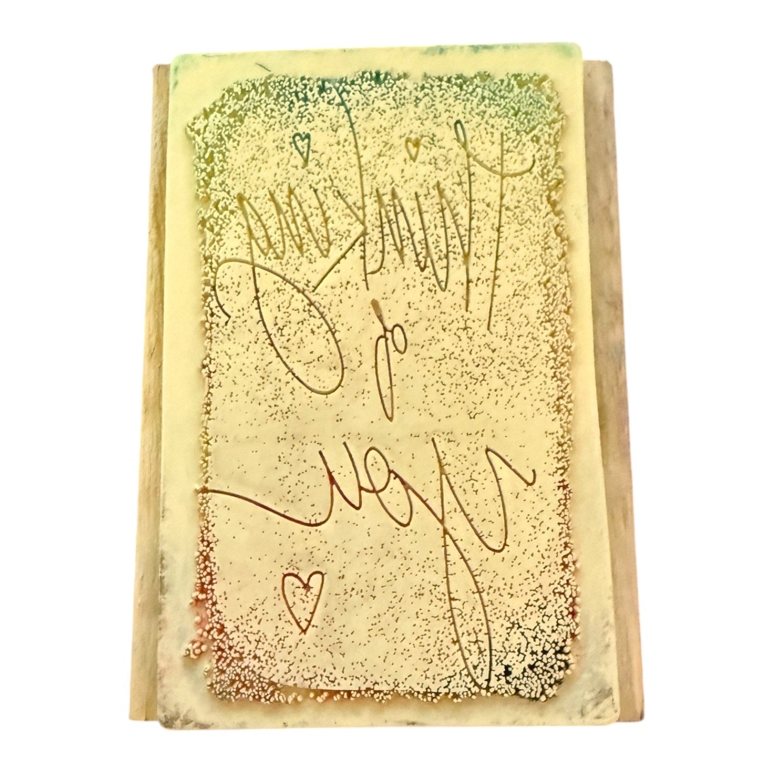 back of stamp with engraved text and designs on a white background