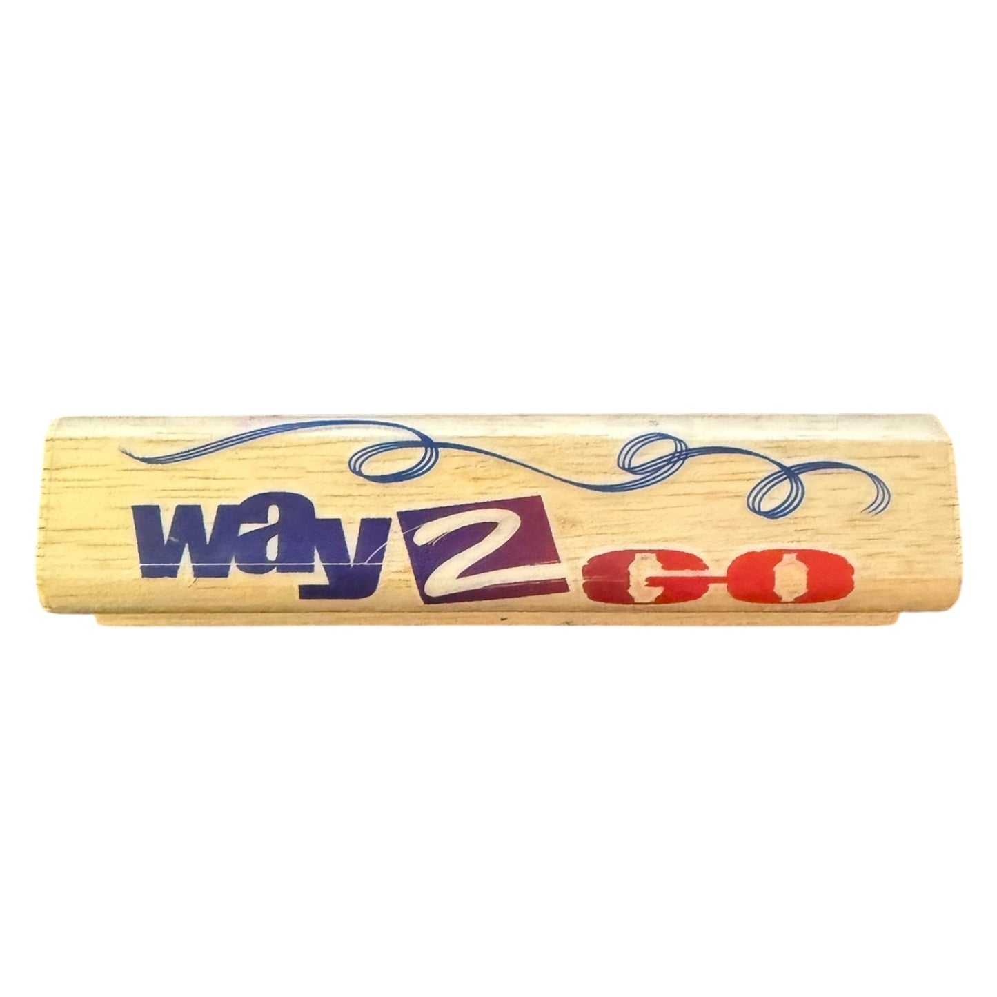 A rectangular wooden stamp block featuring the words 'way 2 go' i with a blue decorative swirl above, shown on a plain white background.
