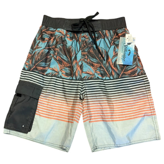Front of multicolored shorts with tropical leaf pattern and striped design on a white background