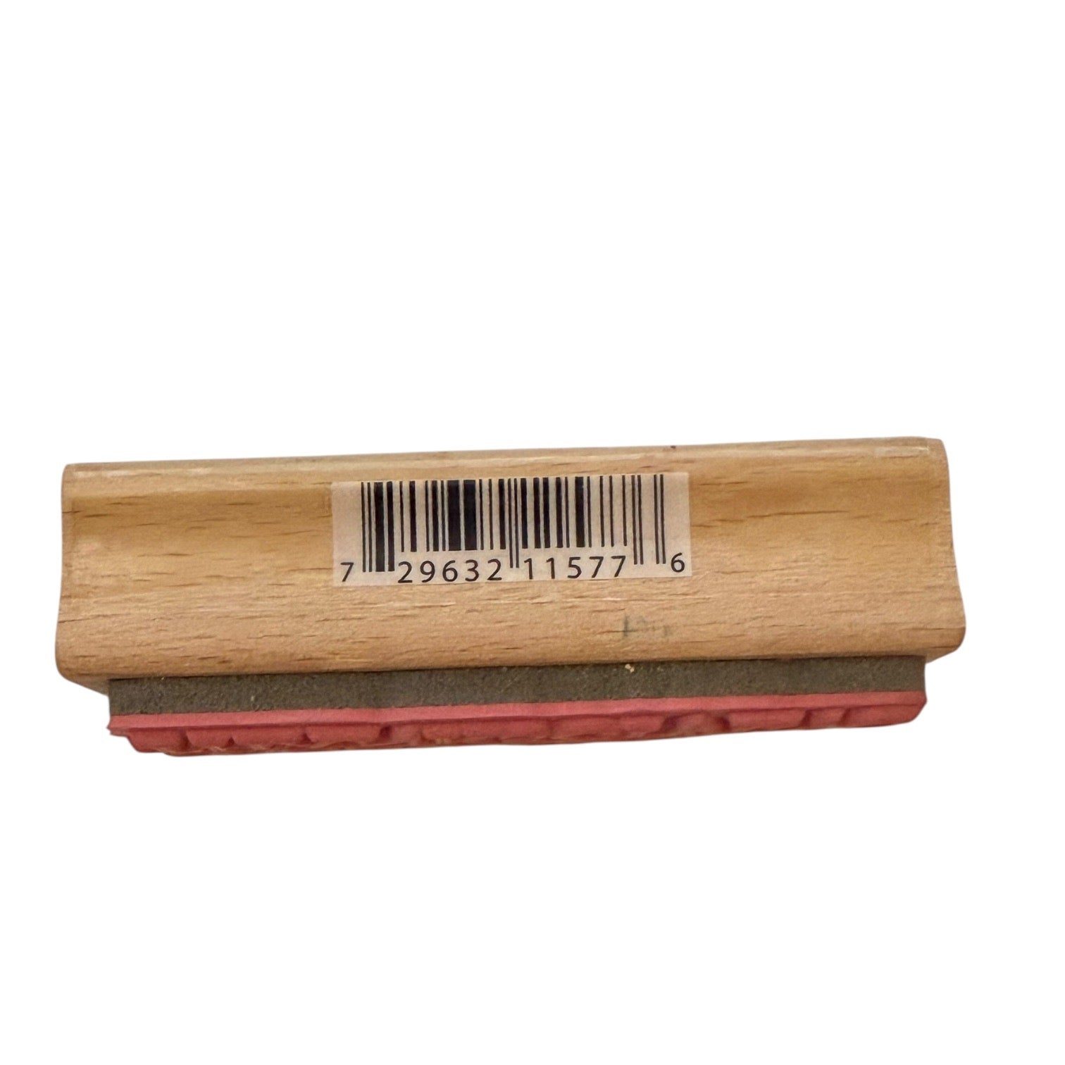 Wooden stamp with red ink pad and barcode label on a white background