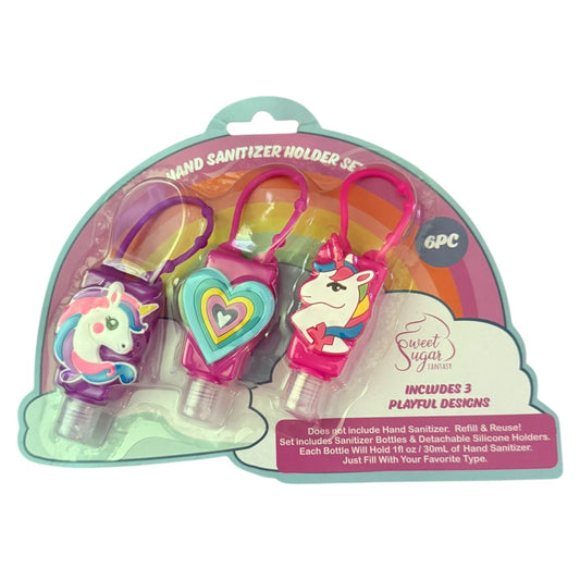 A 3-pack of Sweet Sugar Designs unicorn-themed hand sanitizer holders in a clear plastic blister pack with a teal and pink backing card.