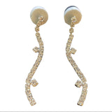 Front of faux diamond earrings