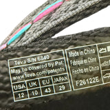 Close-up of a label on a shoe with text and product details.