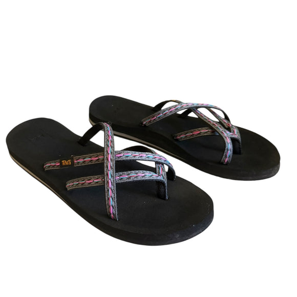 Front side Black flip-flops with colorful straps on a white background