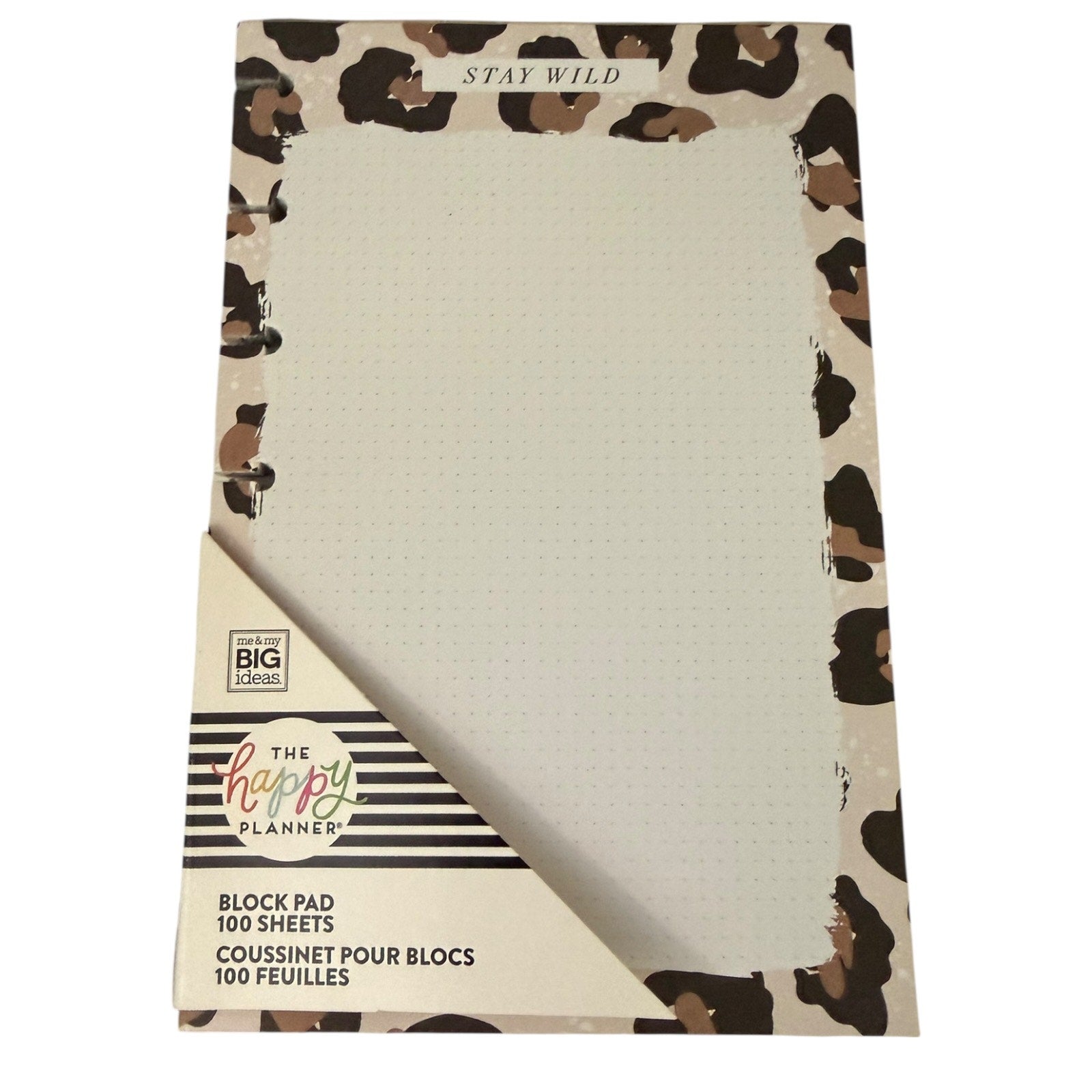 Pad of paper with an animal print from The Happy Planner on a white background. 