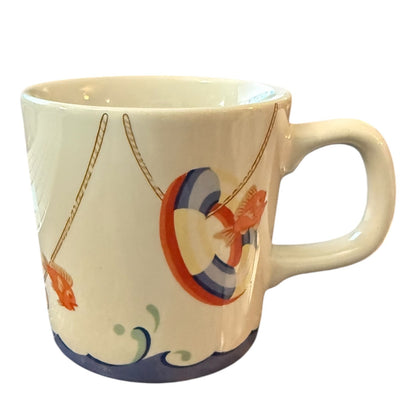 Mug with sea and fish design on a white background
