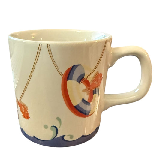 Mug with sea and fish design on a white background