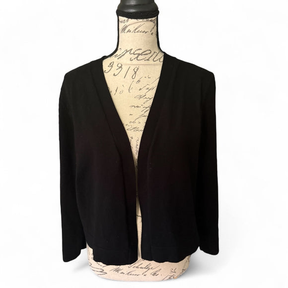 Front of black cardigan on a mannequin with a white background