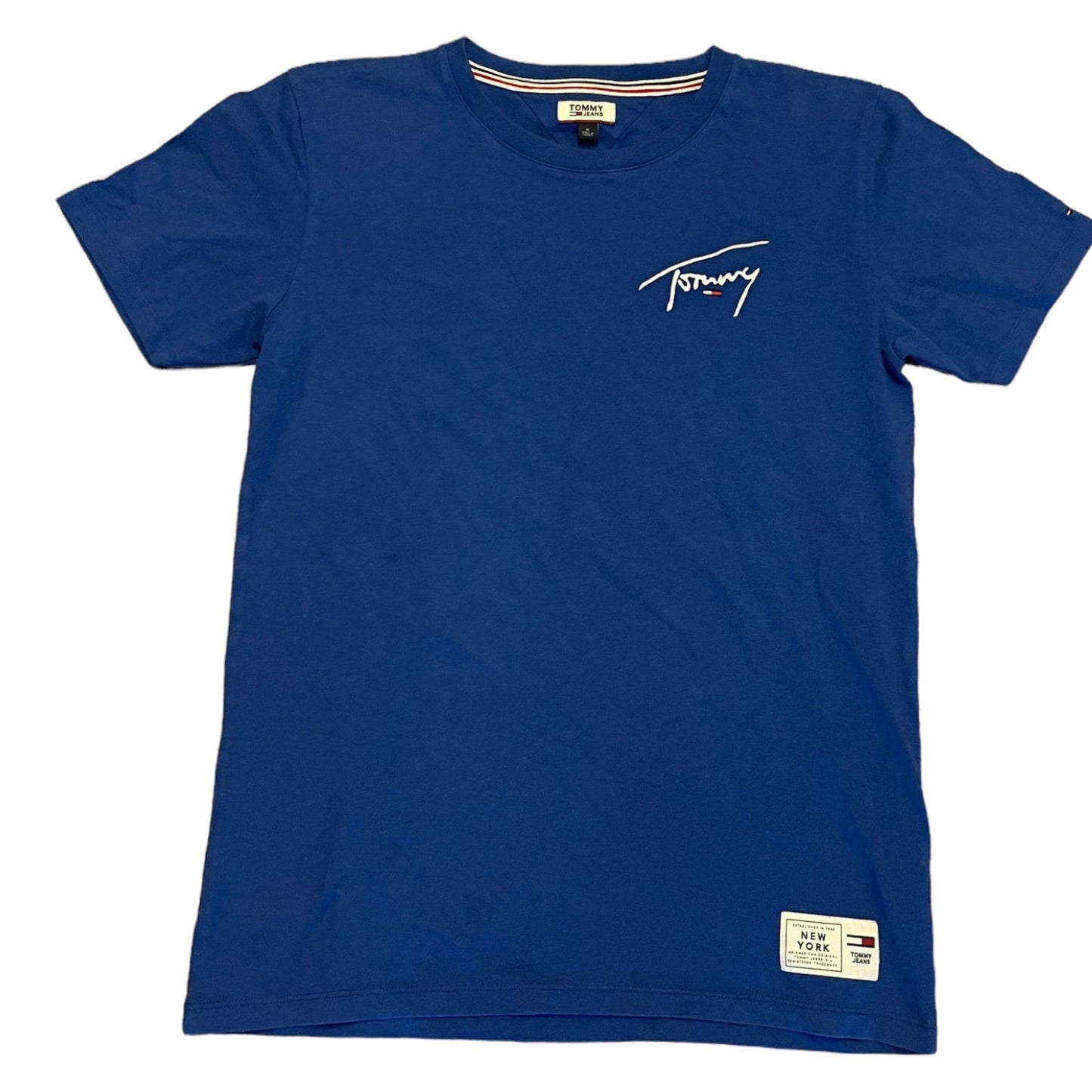 Front of Blue t-shirt with a logo on a white background