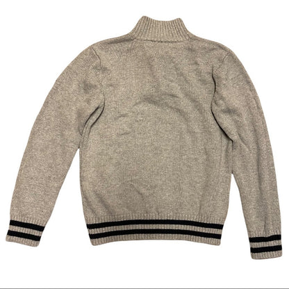 Back view of a gray sweater with black trim on cuffs and waistband.