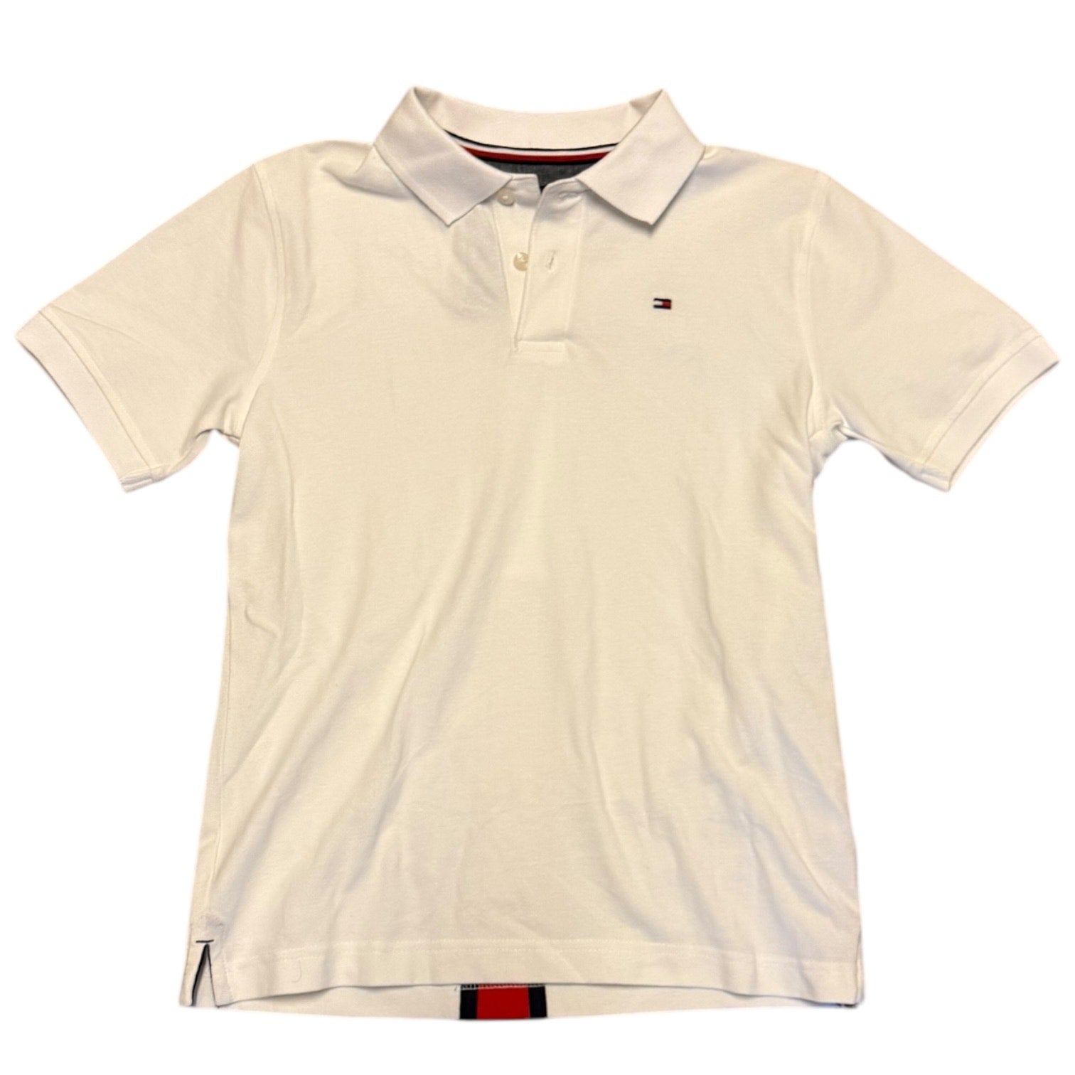 Front of white polo shirt with brand logo on a white background