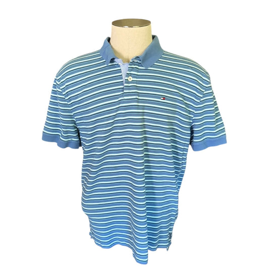 Front of Blue and white striped polo shirt on a mannequin with a white background