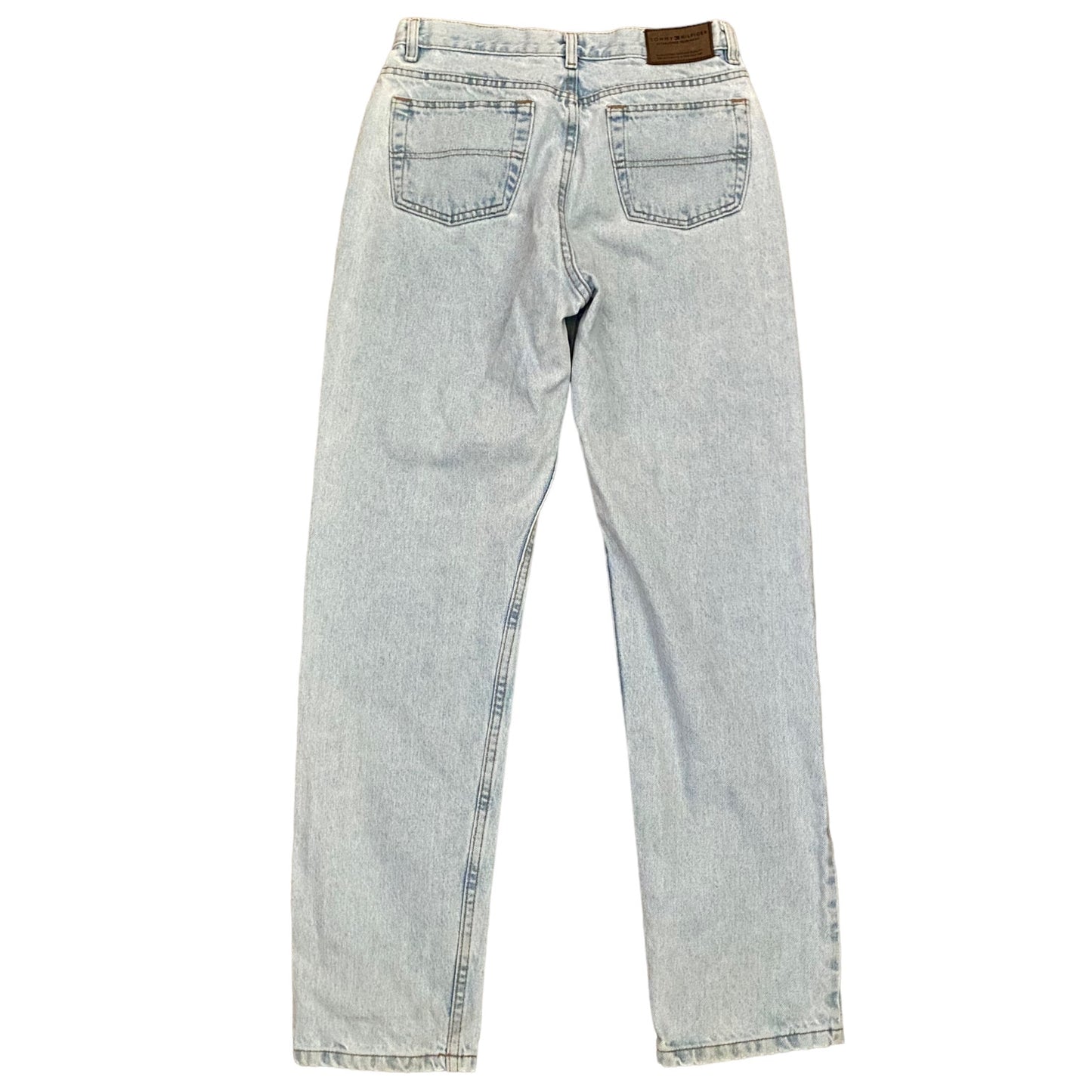 Light wash blue denim jeans shown from the back, featuring a classic five-pocket design and a brown leather brand patch at the waistband.