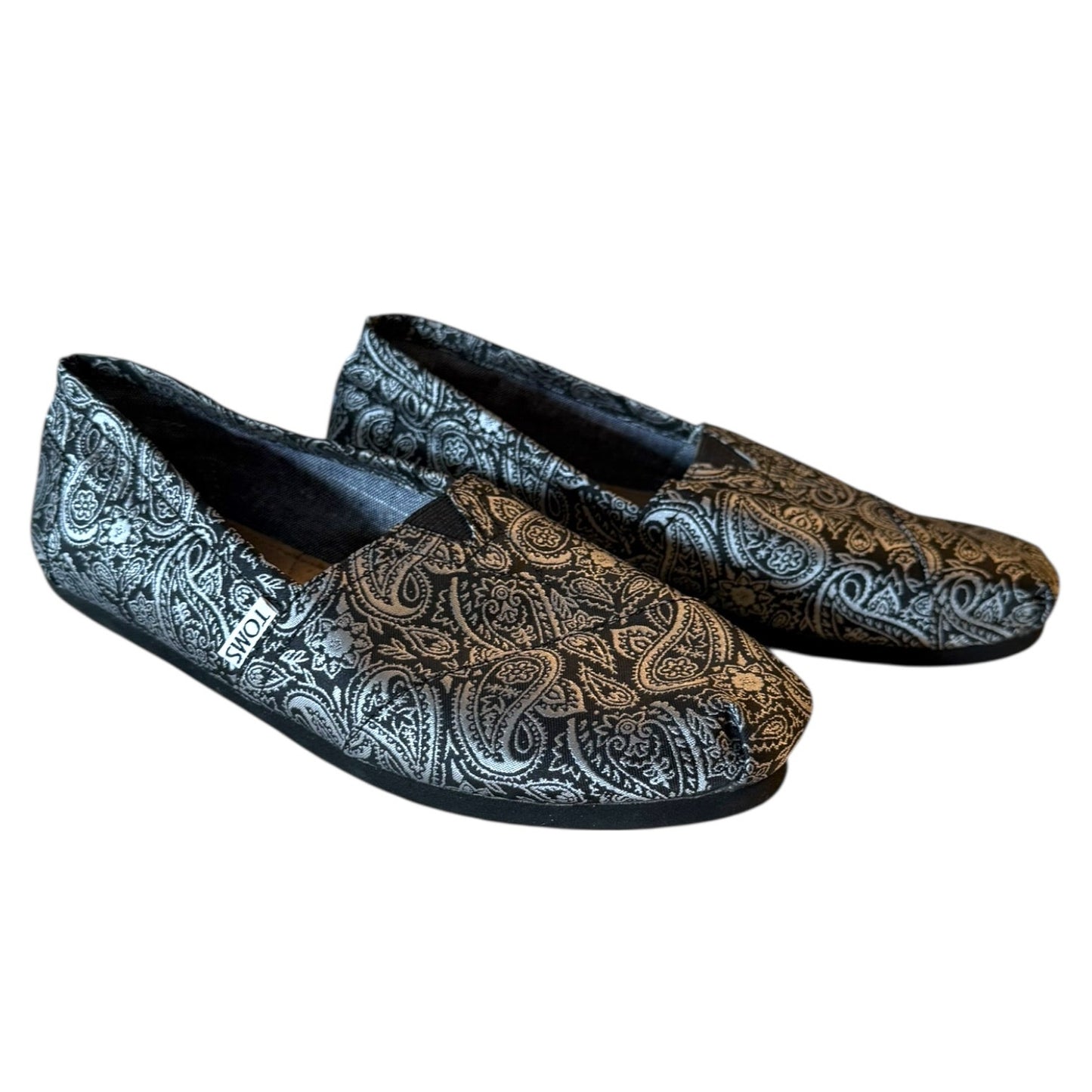 Side view of black and silver loafers on a side view