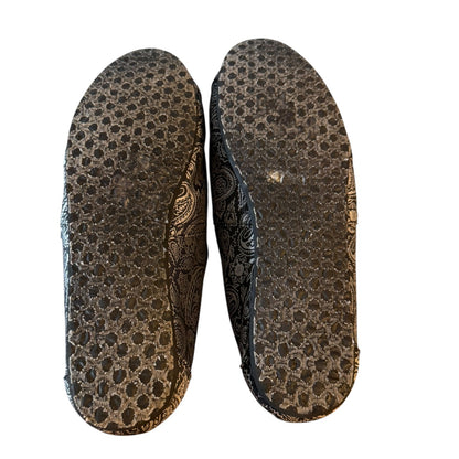 A pair of black textured shoe insoles with a subtle paisley pattern, shown from the bottom against a plain white background.