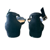 Back of black shoes with a strap on a white background