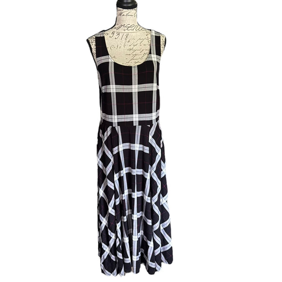 Front of Black and white checkered dress on a mannequin against a white background