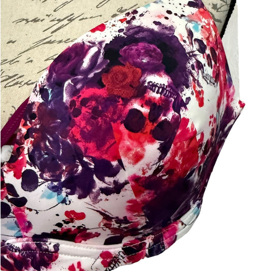 Colorful floral-patterned bra close up on a textured background