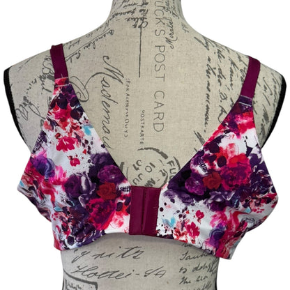 Back of bra on a mannequin against a vintage-style background