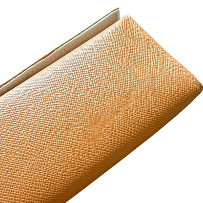 orange textured case on a white background showing issues