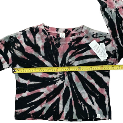 Tie-dye shirt with a measuring tape on a white background